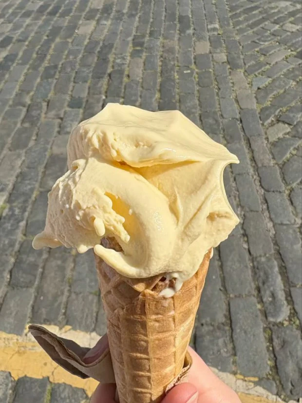 Passionfruit gelato on a cobbled street